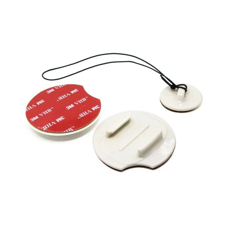 Two white adhesive pads with red backing on a white background