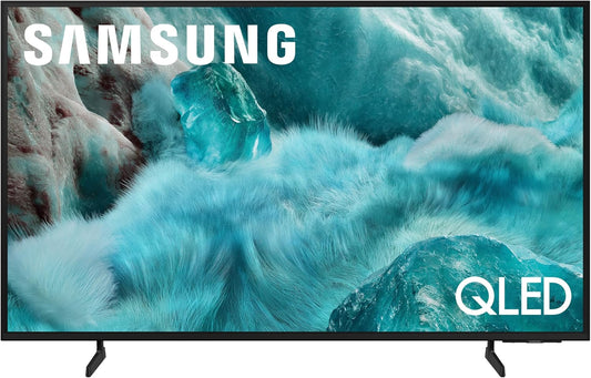 Samsung QLED TV displaying a nature scene with rocks and water.