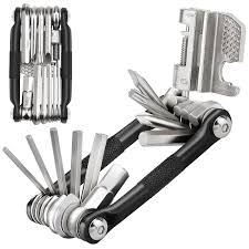 Multitool with various tools extended on a black background