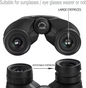 Black binoculars with large eyepieces and rotatable eyepieces on a white background
