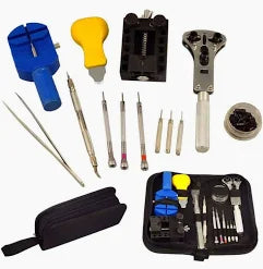 Set of jewelry-making tools in a black case on a white background