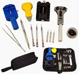 Collection of small tools and accessories on a white background
