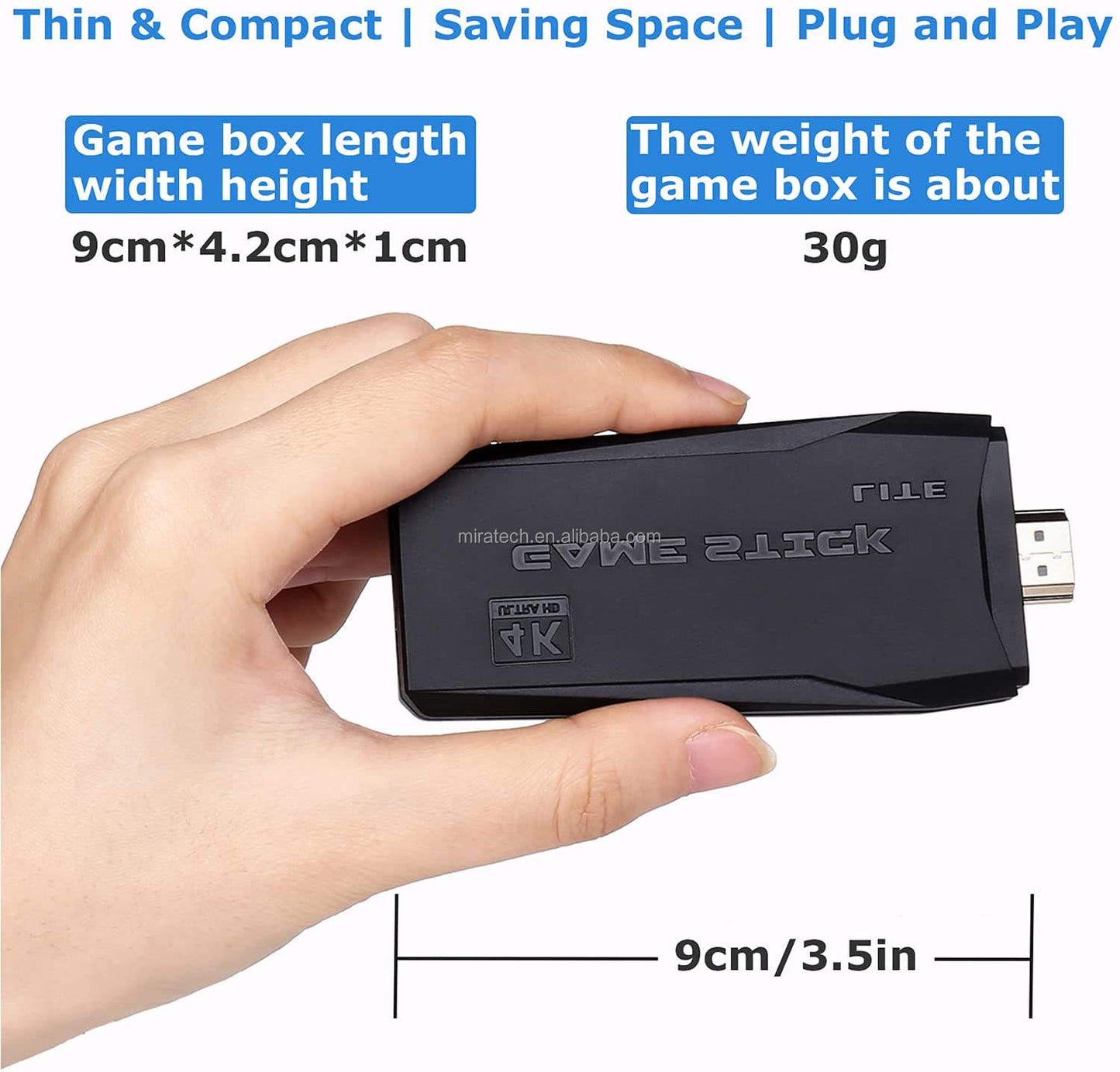 Hand holding a small black device with text about its dimensions and weight.