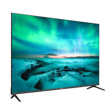 Smart TV displaying a scenic image of a lake with mountains and green sky.