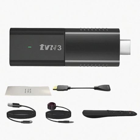 TVii3 device with cables and accessories on a white background