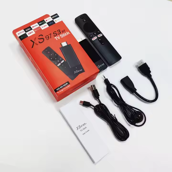 X97 S3 TV stick with packaging, remote control, cables, and manual on a white background