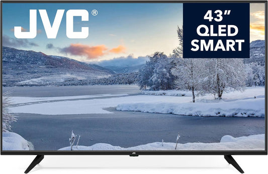 JVC 43-inch QLED smart TV displaying a winter landscape with snow-covered trees and mountains.