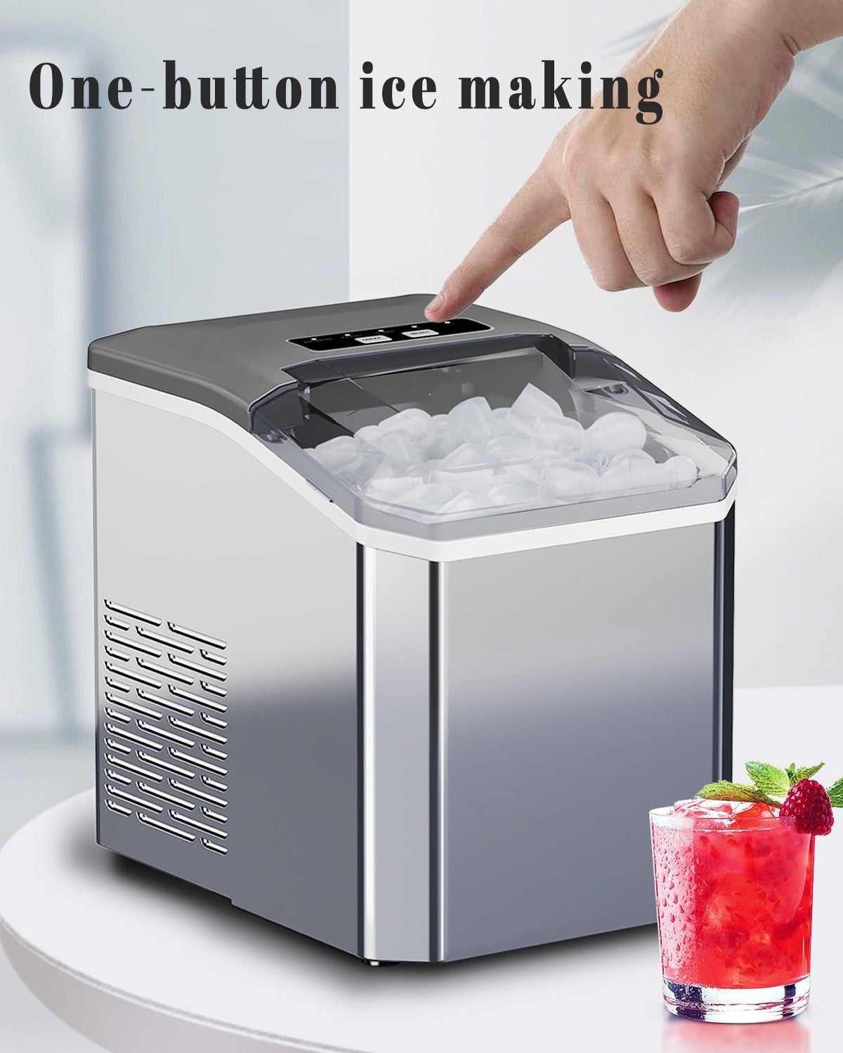 Ice maker with a hand pressing a button and a glass of iced drink on a white background