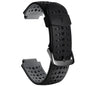 Black perforated watch strap on a white background