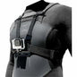Black camera harness with a GoPro attached on a person, against a black background