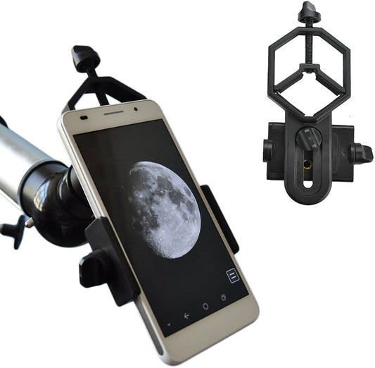 Phone with telescope attachment displaying moon image on screen
