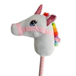 Unicorn plush toy with rainbow hair and pink mane on a white background
