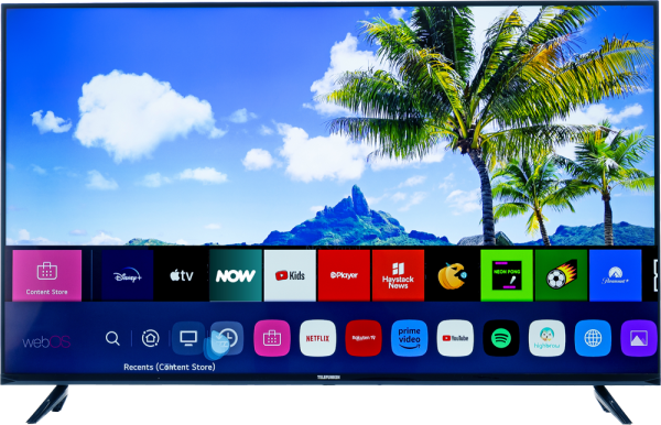Smart TV displaying a tropical landscape with palm trees and a blue sky.